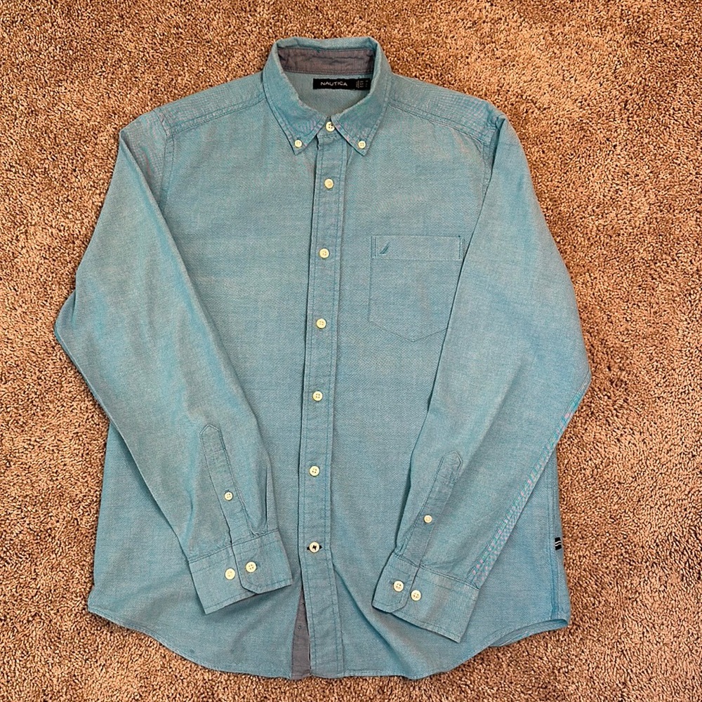 Nautica blue Oxford shirt. Size Medium. Good condition. minor flaw. See photos.